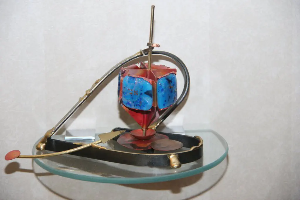 Enameled bright blue on red dreidel