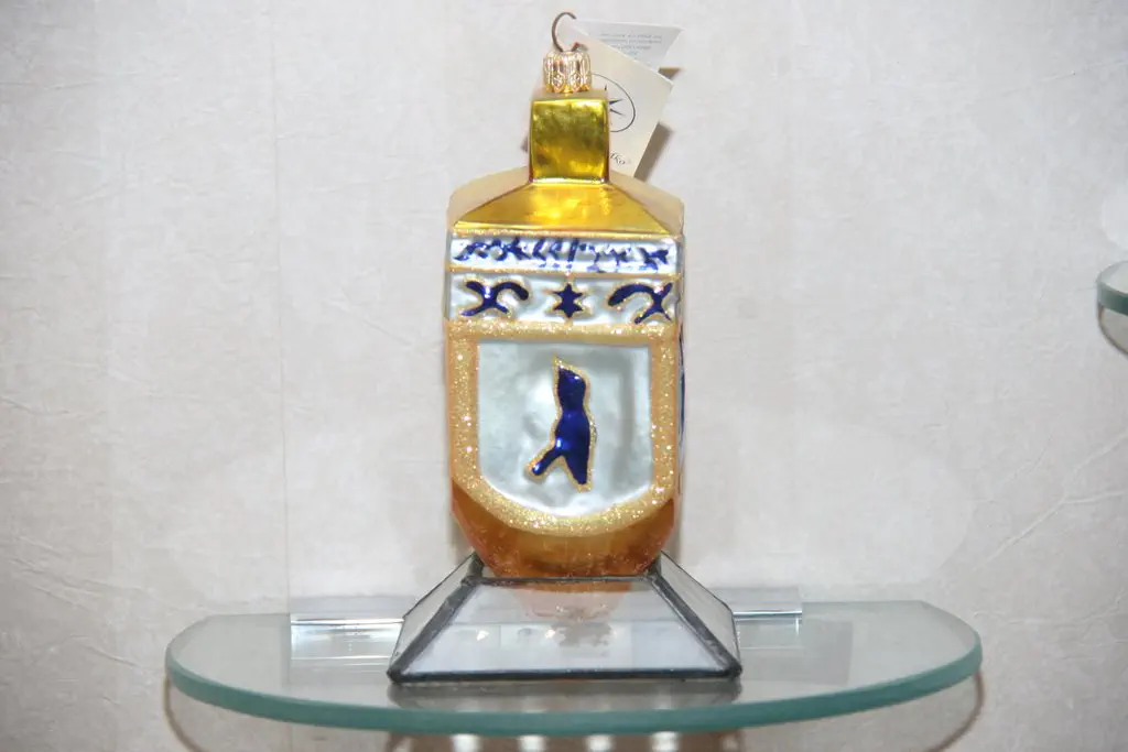 Gold and white enamel dreidel