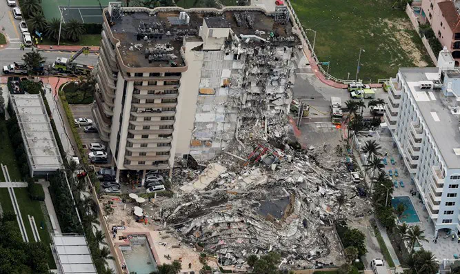 REUTERS/Marco Bello רב הקהילה: "נחמה למשפחות האומללות"