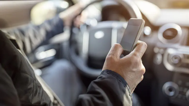 Phone use while driving? You could get hit with a 10k NIS fine