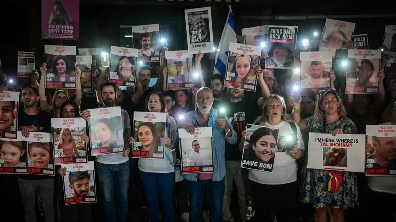 Families of captives sing national anthem