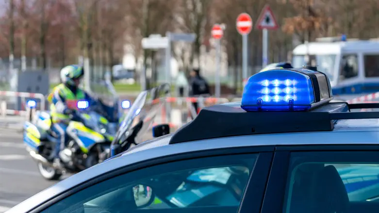German police officer punches pro-Palestinian protester