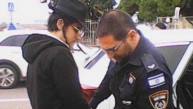 Watch: Watch: Man arrested in Haifa while honoring fallen brother