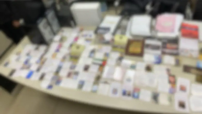 Police raid Ramallah printing house, arrest two suspects