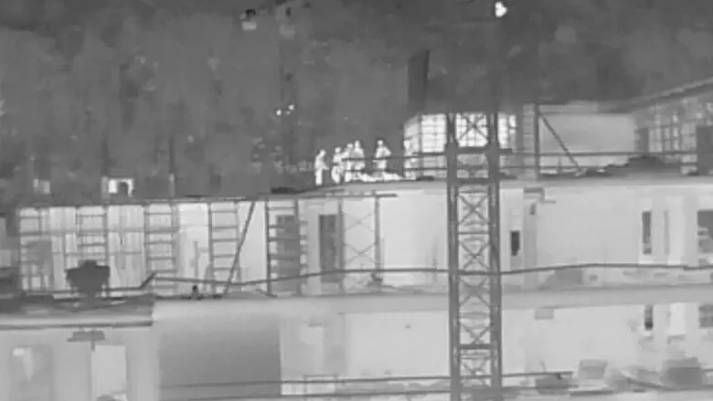 Police drone exposed illegal infiltrators on roof