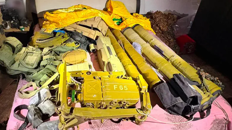 Civilian bedroom turned into arms cache