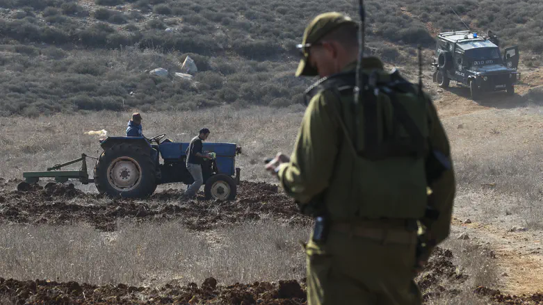 IDF clashes with activists at new outpost near Qusra