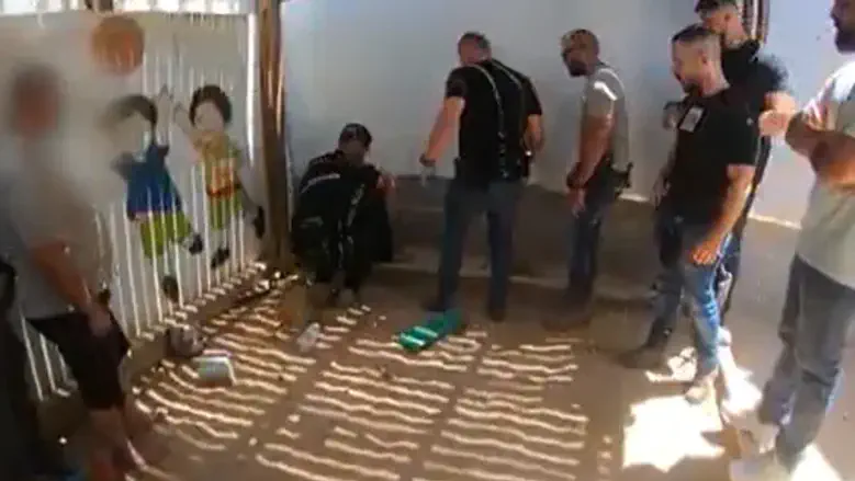 Police find M-16 hiding in preschool sandbox