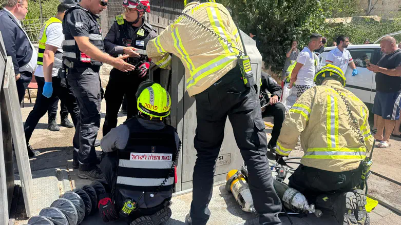 Man pulled alive from underground Jerusalem garbage container