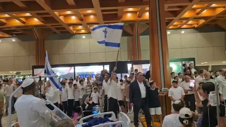 Courtesy of the photographer Moving: Yeshiva students sing and pray in Sheba hospital