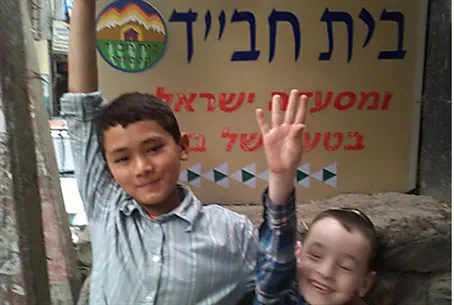 courtesy Lubavitch.com Nepalese Boy Brings Light to Chabad House in Kathmandu