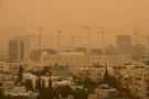 Miriam Alster/Flash90 Forecasters: Dust storm ending, but may return