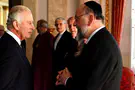 Reuters Foreign Secretary clashes with Chief Rabbi over Israel sanctions