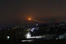 Reuters Mystery blasts rock Syrian military sites
