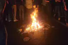 Left wing protesters light bonfire on Ayalon Highway