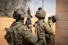 Terror suspect shot while fleeing forces and is arrested