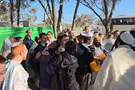 Watch: Youth group members sing at the scene of the Nova Massacre