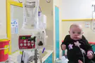 Her heart defies death. Our hearts can save her