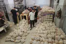 Watch: Tens of thousands of pitas baked in Gaza