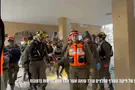 Holocaust survivor rescued from rubble after missile strike