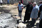 Amb. Huckabee visits PA village near torched church