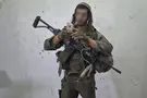 Why This Soldier’s Smile Doesn’t Reach His Eyes