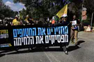 Leftist protesters set garbage cans on fire near PM's residence
