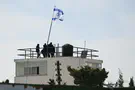 Israeli flag flies on roof of UNRWA headquarters in Jerusalem