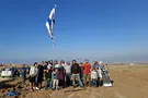 Civilian activists raise Israeli flags in Gaza