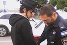 Watch: Man arrested in Haifa while honoring fallen brother