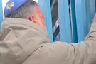 UNRWA worker murdered his son, now he affixed a mezuzah on its HQ