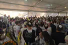Arutz Sheva Students of Rabbi Avi Goldberg sing together at his grave