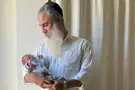 Rabbi welcomes 6th son less than a year after losing both legs