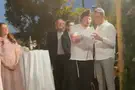 Seriously injured soldier says blessing at friend's wedding