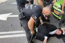 מאיר פ. Police throw smoke grenades, beat protesters with batons