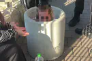 Game turns serious: Child finds himself stuck in concrete bin
