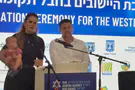 Bereaved father attacks Smotrich, bereaved daughter defends him