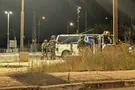 2 hurt as car thief, smuggler breach checkpoints