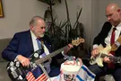 Ohana and Huckabee play US anthem
