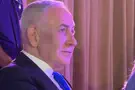 Watch: Netanyahu views video of Rebbe at farewell event