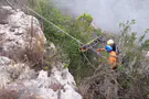 Fire and rescue service Driver survives 15-meter plunge from cliff in Carmel Park