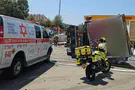 Truck plows into vehicles after overturning at gas station