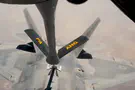 צילום: CENTCOM מטוס F-22 חמקני מתודלק באוויר