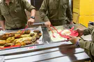 Training stopped after dozens of soldiers fall ill