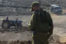 Nati Shohat/Flash90 IDF clashes with activists at new outpost near Qusra