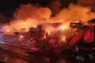 Firefighting crews battle blaze at vehicle lot in Kiryat Arba