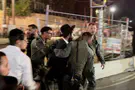 Police spokesperson Rioters torch bins, tear down light rail barriers