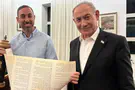 Rabbi presents Netanyahu with biblical-style scroll on Iran war