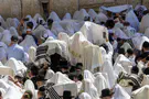 After moments of terror in the air, mass prayer at Western Wall