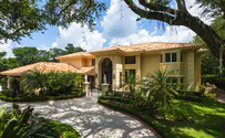 Woman refuses to return $1.2 mil, buys house, SUV instead